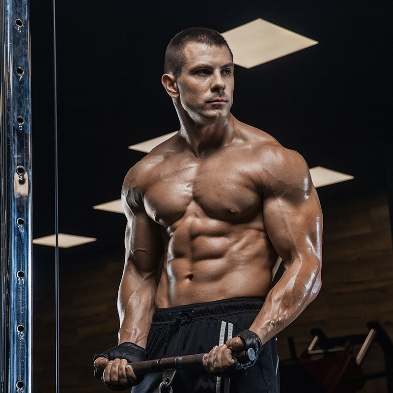 MAN POSING IN THE GYM