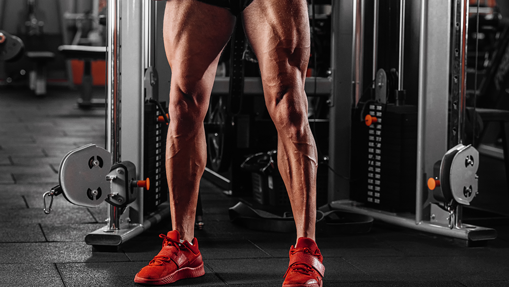 muscular legs in red shoes